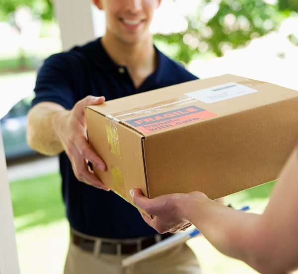 Series with with a delivery man dropping off flowers, boxes, balloons, etc. to a residential suburban home.